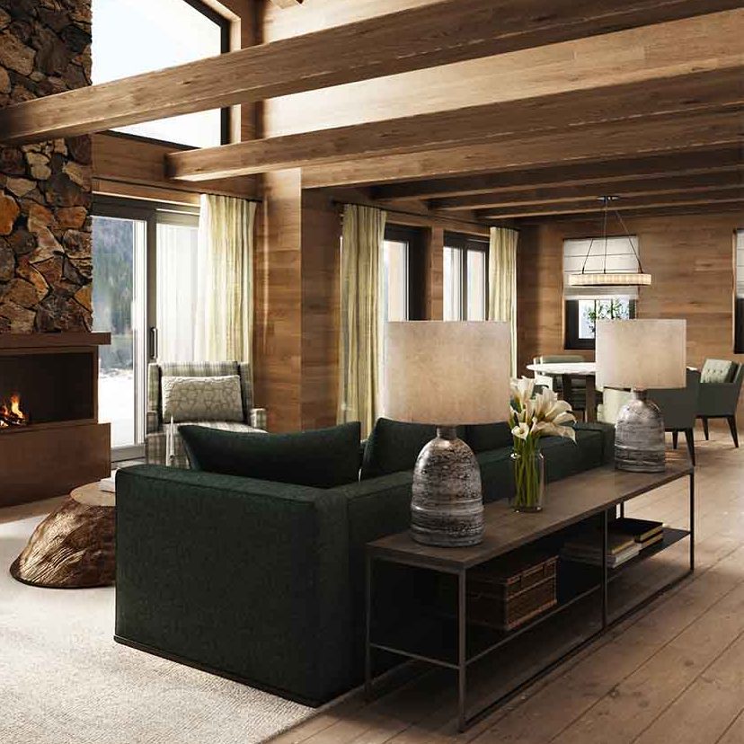Chalet Kitzbühel gemütliches Wohnzimmer mit Kamin im eleganten Chalet Stil von Hendrik Ritschel Interior Design
